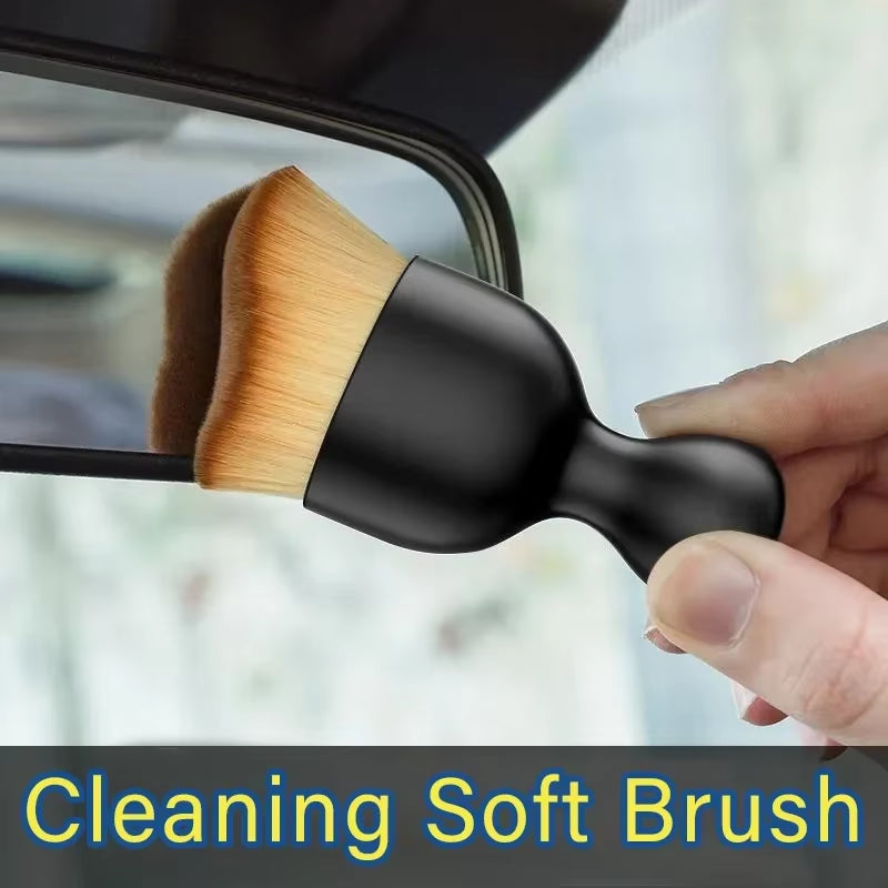Brush wiping dust off a car rearview mirror mount, labeled Cleaning Soft Brush
