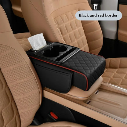 Black quilted armrest cushion with red trim, cup holder tray, and tissue box on tan car seats