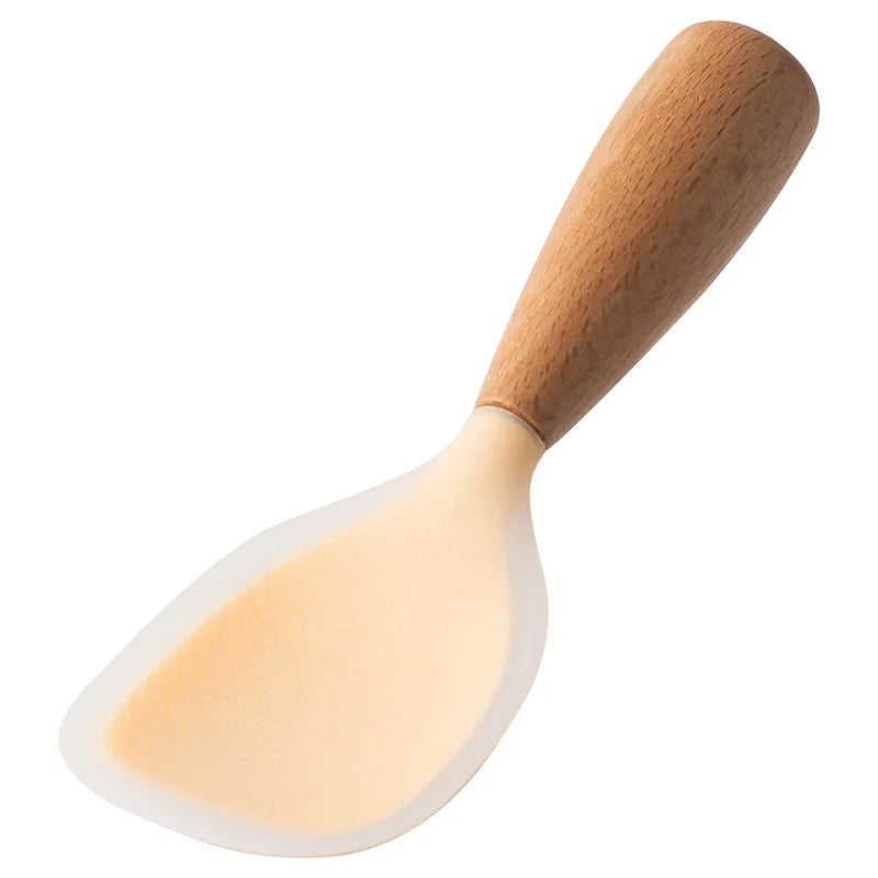 Beige/tan silicone rice paddle with beech wood handle, angled studio shot on white background