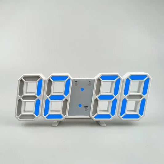 White-bodied LED clock with blue glowing digits reading 88:88 on a plain grey studio background