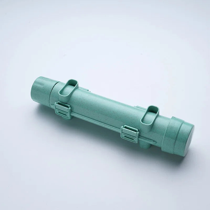 Mint green sushi-rolling tube device shown diagonally on a white background