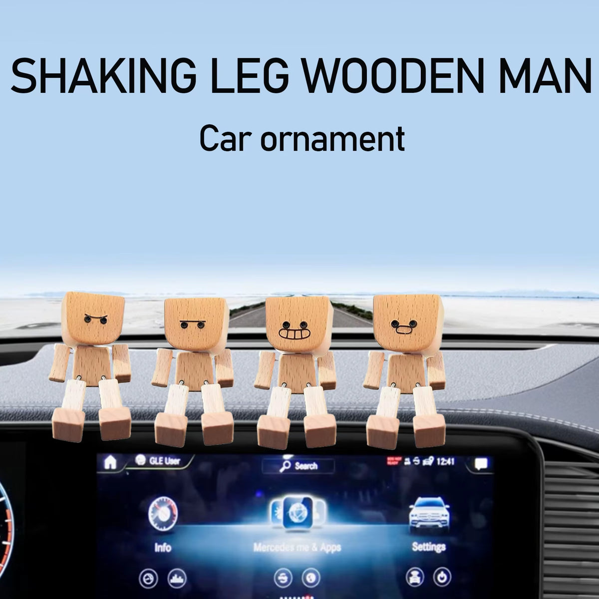 Four figurines with different expressions lined up on a car dashboard with a snowy road visible outside