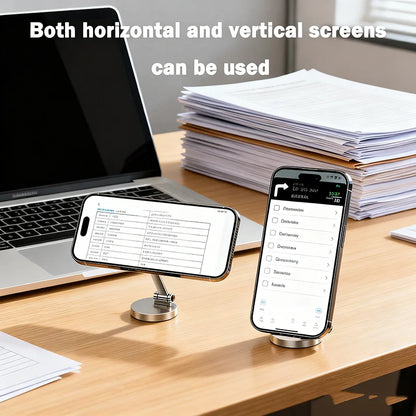 Two phones mounted on a wooden desk beside a laptop, one in landscape and one in portrait orientation