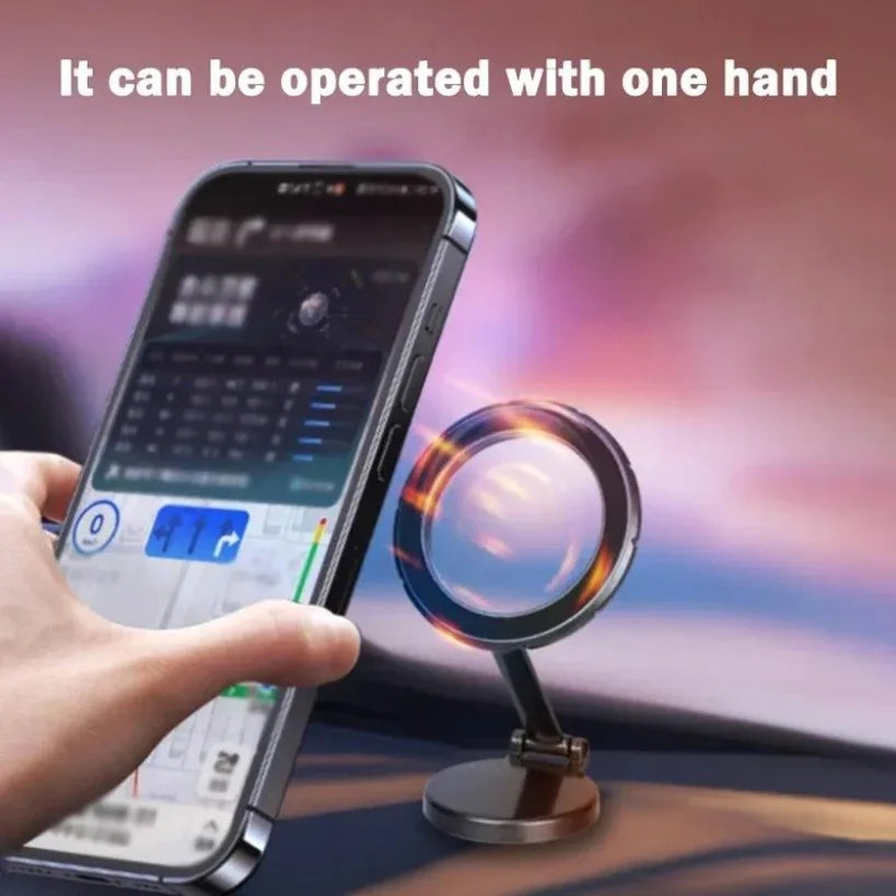 Hand attaching a phone with one hand to the glowing mount against a blurred sunset background