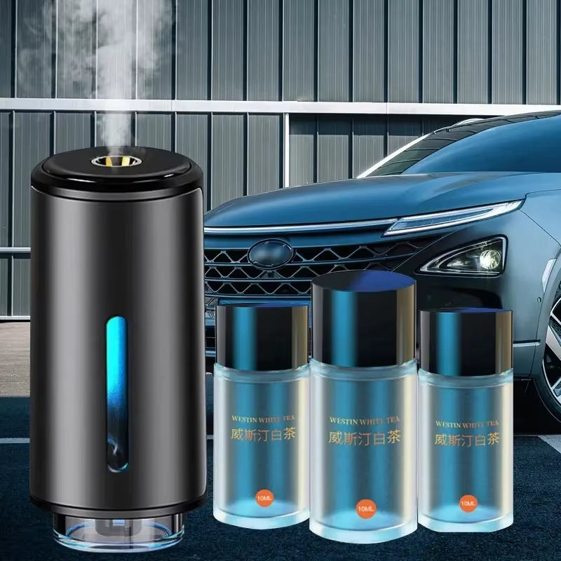 Diffuser releasing visible white mist beside three Westin White Tea refill bottles, with a blue car behind