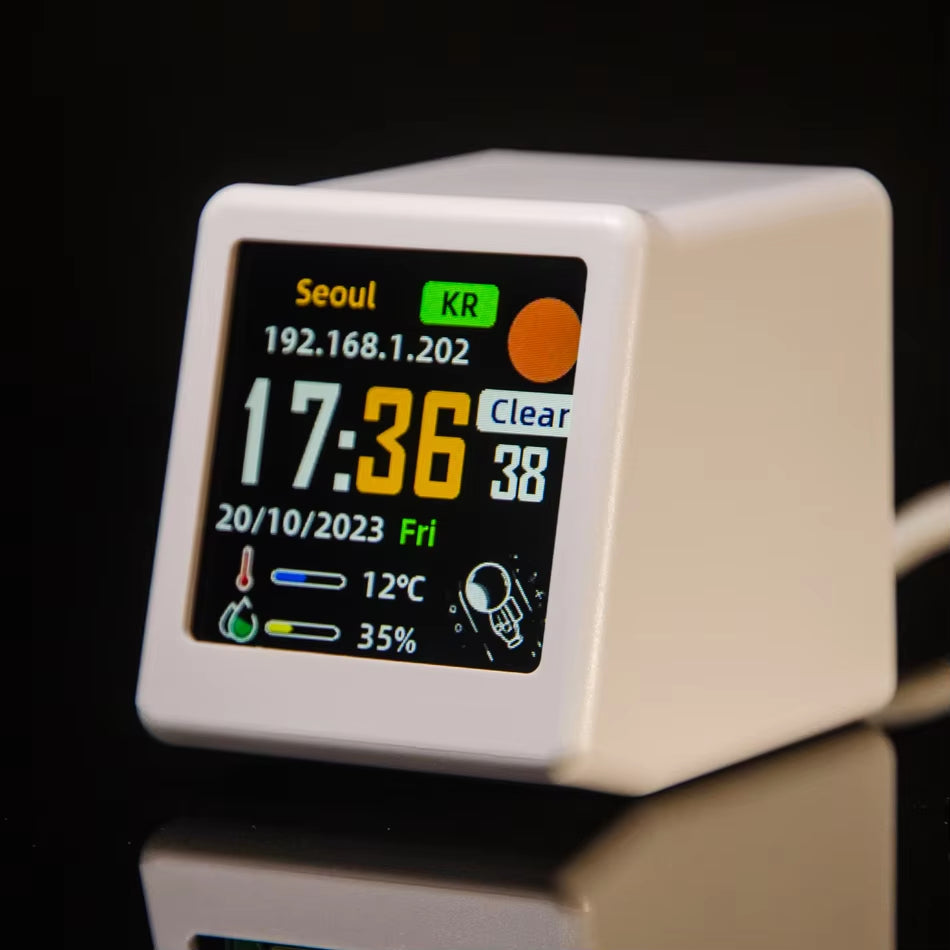 White weather clock front view displaying Seoul weather and WiFi IP address on screen