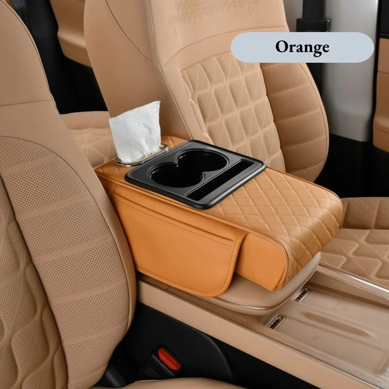Orange colorway of the quilted armrest cushion with cup holder tray and tissue box, labeled Orange