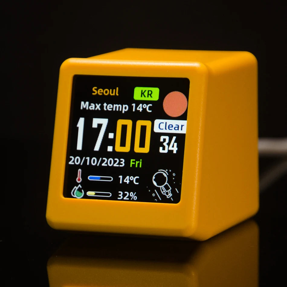 Yellow WiFi weather clock front view showing Seoul weather, 17:00 time and temperature on screen