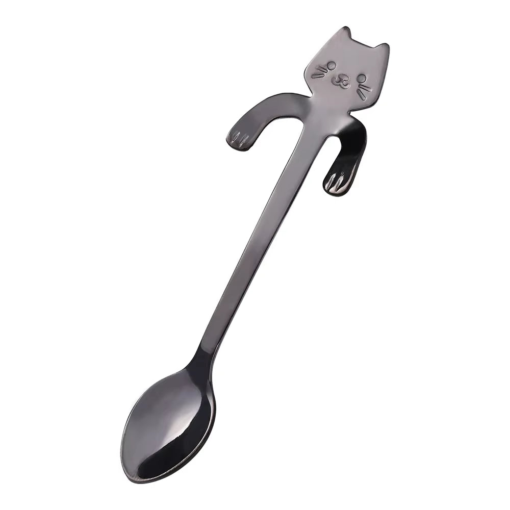 Gunmetal black cat-shaped spoon shown diagonally on a white background
