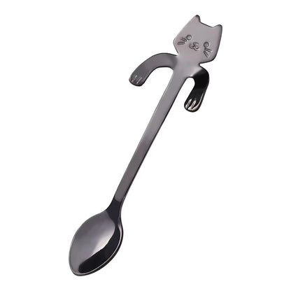 Gunmetal black cat-shaped spoon shown diagonally on a white background
