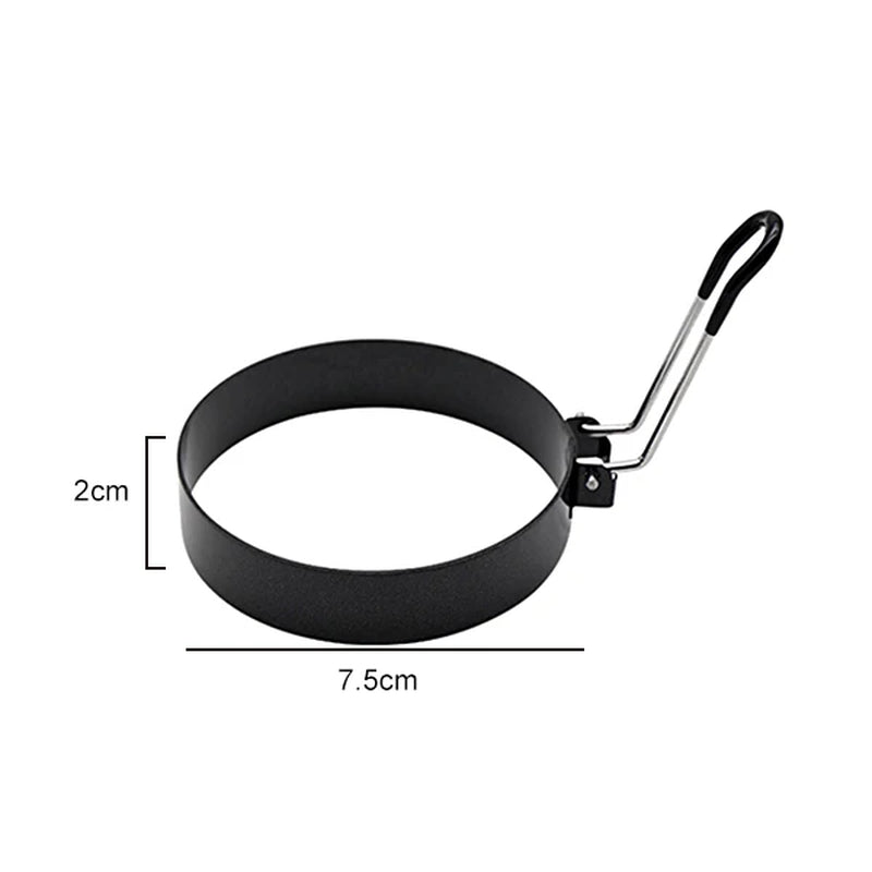 Smallest ring in the set: black egg ring with red silicone handle, 7.5cm diameter and 2cm height