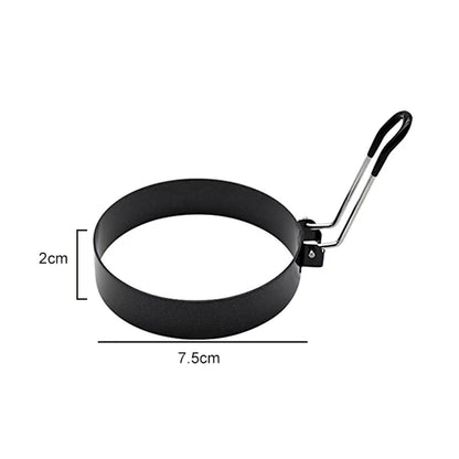 Smallest ring in the set: black egg ring with red silicone handle, 7.5cm diameter and 2cm height