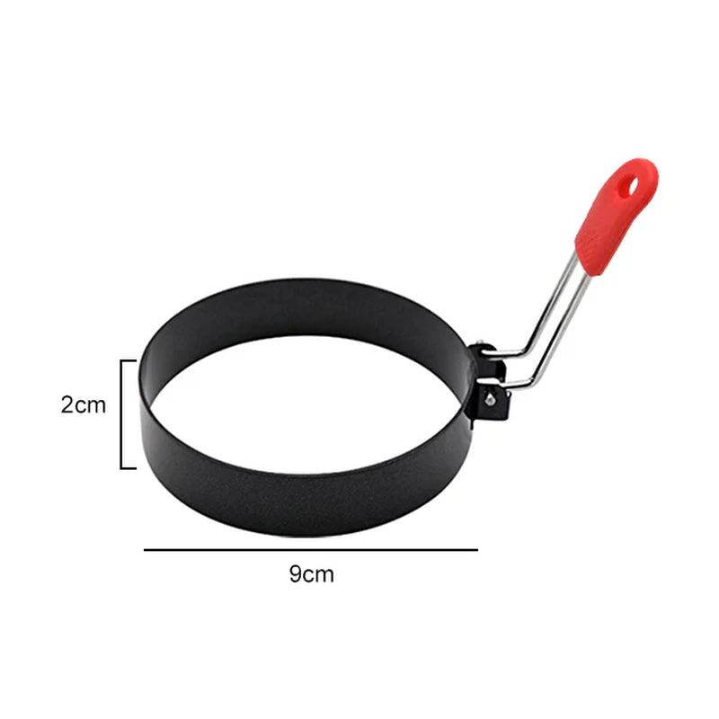 Black egg ring with red silicone handle, dimension diagram showing 9cm diameter and 2cm height