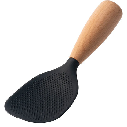 Black silicone rice paddle with beech wood handle, angled studio shot on white background