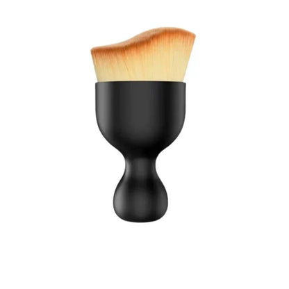 Single detail brush with black hourglass handle and tan bristles on white background