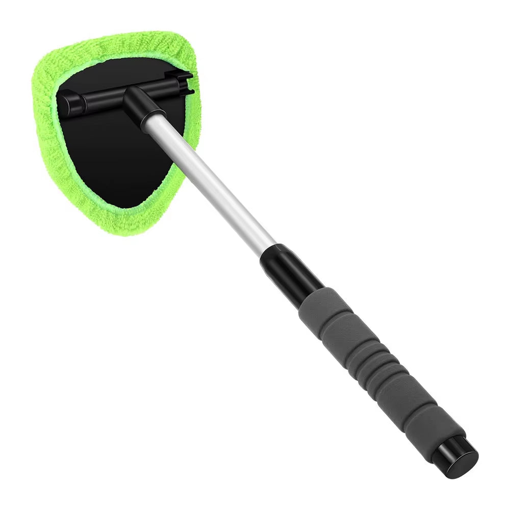 Product shot of the brush with green microfiber head and extendable handle on white background